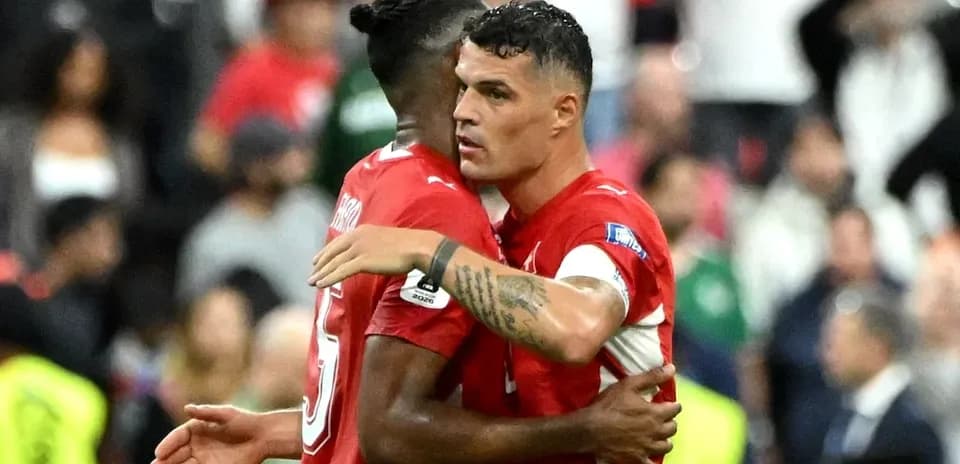 Jugadores suizos celebrando en el partido