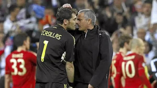 Iker Casillas conversing with José Mourinho after match
