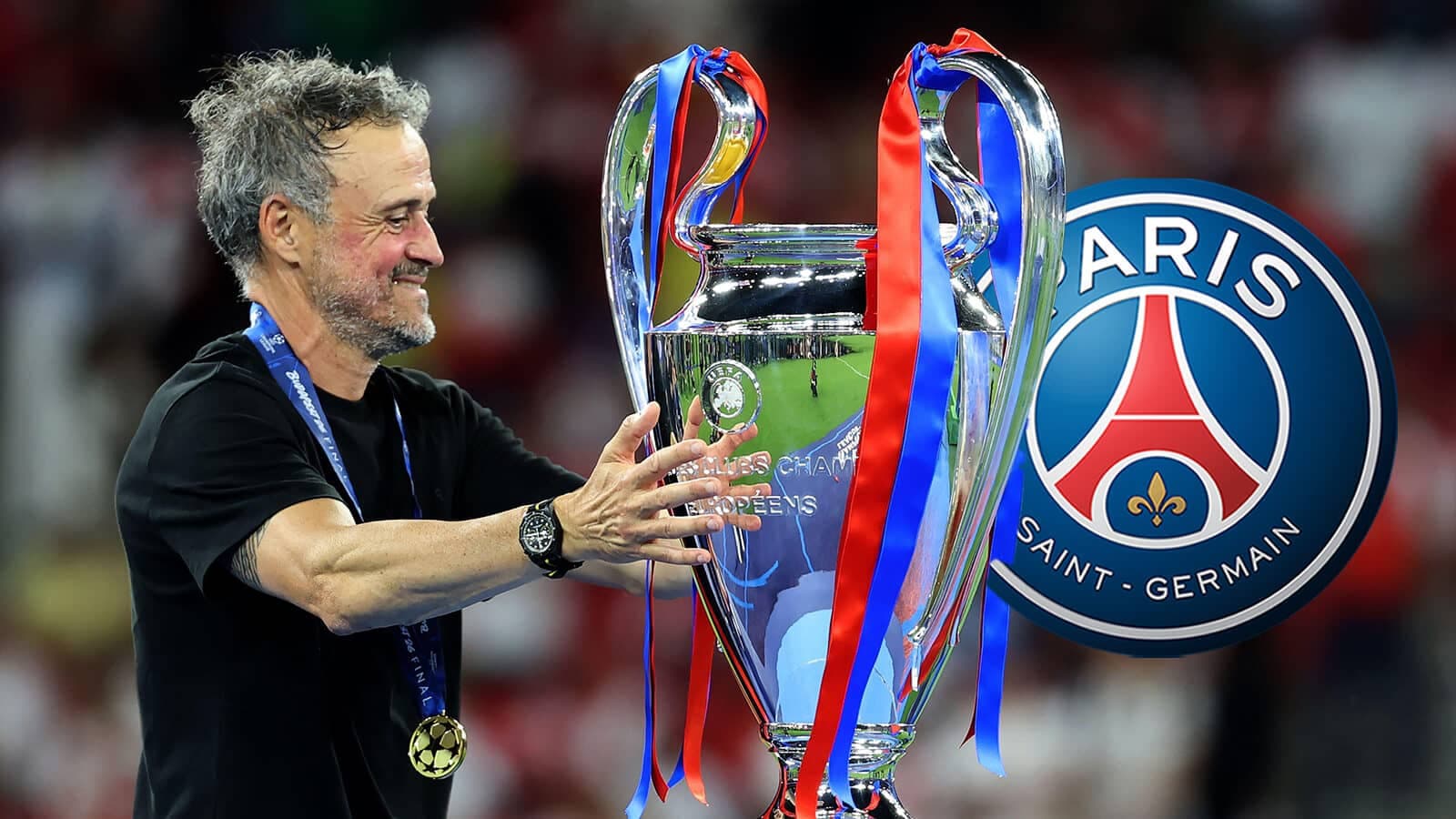 Entrenador de PSG levantando trofeo de la UEFA Champions League Entrenador de PSG levantando trofeo de la UEFA Champions League